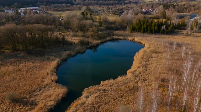Aerial view of the upper course of the Wurm River from Starnberg to Leutstetten. The Leutstettener Moos nature reserve is located in the Leutstetten district of Starnberg, Upper Bavaria, Germany. 
