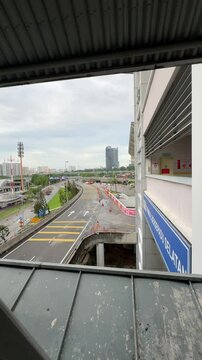 a view in front of Terminal Bersepadu Selatan or TBS bus station in KL. road and buildings view from TBS bridge. major transportation hub intercity bus