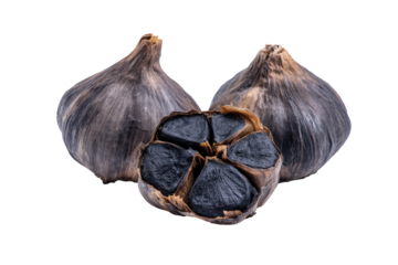 Black garlic cloves lined bottom edge overhead flat-lay isolated on transparent background