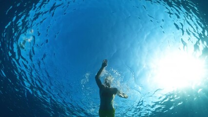 Swimmer Training For Long Distance Swim In The Deep Ocean Under The Sun 