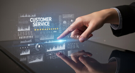 A hand interacting with a customer service interface on a reflective touchscreen device display panel