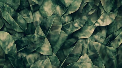 Close-up view of a dense collection of leaves in deep greens and greys.