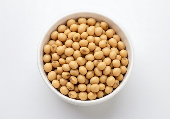 Bowl full of soybeans on a white background top view