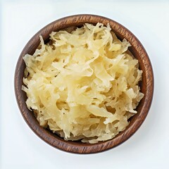 Bowl of fresh, crunchy sauerkraut ready for a delicious meal.