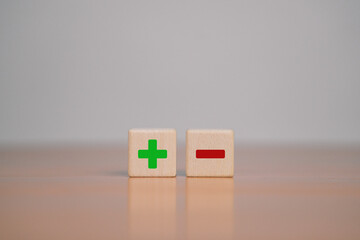 The wooden block with the word interest represents increased financial concerns and investment. It...