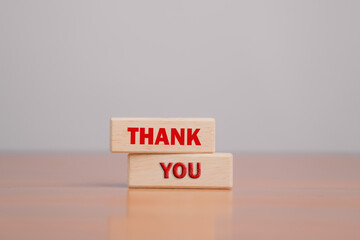 Thank you symbol, wooden block with thank you text, beautiful white background, business and...