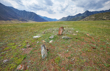 Ancient burials in the Altai mountains on terrace of the Katun and Bolshoy Yaloman rivers.