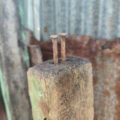 close up of an old rusty nail