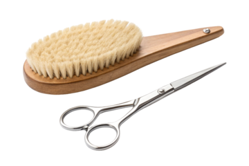 Isolated on white, a wooden comb and hairbrush are beauty tools for hair care and hairstyle