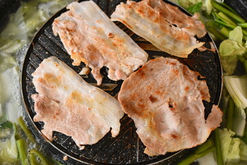 pork barbecue on frying pan, Thai style cuisine
