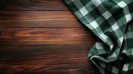 A green and white checkered tablecloth rests gracefully on a dark wooden table, enhancing the cozy atmosphere for events