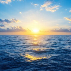 Obraz premium Ocean horizon at sunrise as sun reflects on water surface in wide angle shot with blue sky and clouds