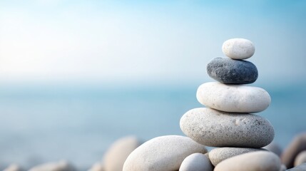 Fototapeta premium A serene stack of rocks on the beach representing balance and success in nature's tranquil environment