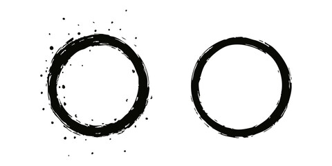 hand-drawn, irregular dark gray circles float on a deep black background, accented by tiny speckles, creating an abstract, minimalist composition with a subtle cosmic vibe