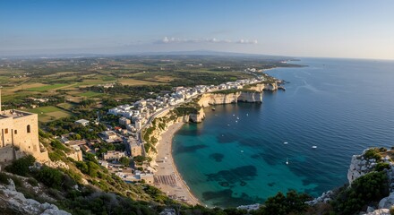Obraz premium Coastal Town with Beach and Turquoise Water Aerial View