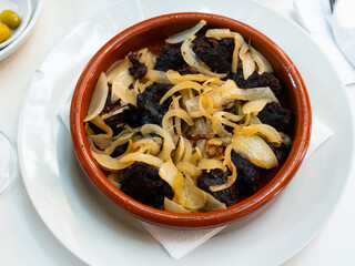 Morcilla con cebolla - traditional Spanish sausage from blood