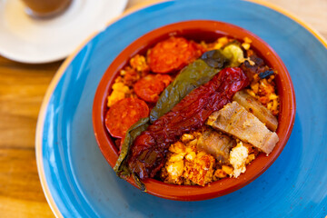 Migas with fish and vegetables. Typical spanish cuisine