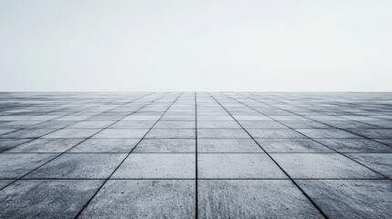 Vast empty concrete floor seamlessly blending into an endless white sky, creating a sense of innovation and tranquility in a minimalist urban design
