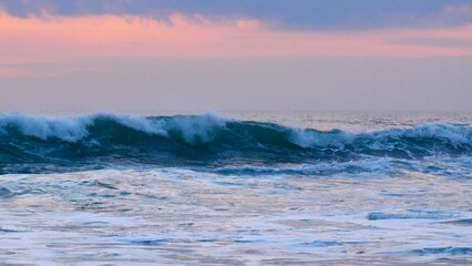Tropical sea beach in summer time Purple sky on sunny day. Golden sand beach sea peaceful scenery on the beach. Travel vacation seaside outdoor. Ocean island beautiful dramatic Magenta landscape