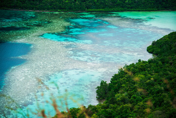 Turquoise ocean sea water white wave splashing deep blue sea. Bird eye view monster wave splash on...