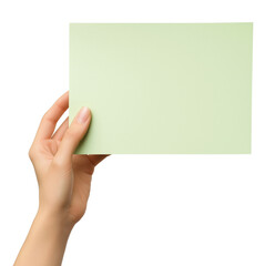 Obraz premium Hand holding a blank light green sheet of paper, isolated on a transparent background