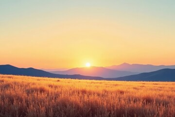 Obraz premium Golden Hour Serenity A Breathtaking Sunrise Over Rolling Hills and a Field of Tall Grass