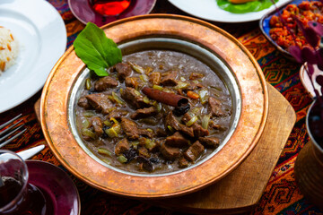 Delicious mutancana from lamb meat stewed with dried fruits. Traditional dish of Turkish cuisine