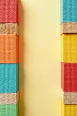 Fototapeta premium Vibrant Stacked Cubes Against a Soft Yellow Background, Creating a Striking Visual Representation of Color Coordination and Simple Geometric Design Principles.