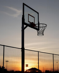basketball sunset, sunset wallpaper, basketball aesthetic, basketball silhouette, sunset court, aesthetic basketball, basketball background, street basketball, basketball art, hoop at sunset, basketba