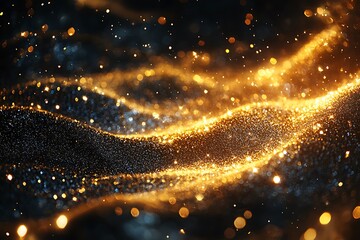 Fototapeta premium Abstract sparkling golden particles floating and glowing against a dark dreamy background.