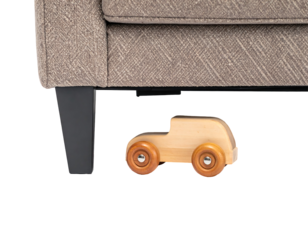 Wooden Toy Car Under Gray Sofa on Transparent Background