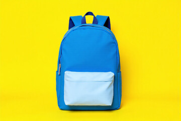 blue and white backpack on a yellow background