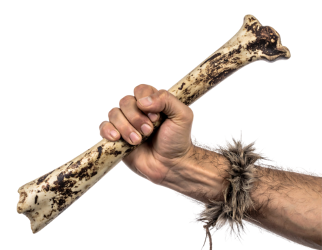 Hand Holding Ancient Bone Against Black Background