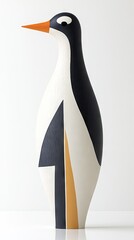 Elegant penguin figurine with minimalist design and sleek, painted surface
