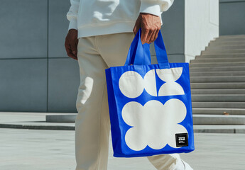 Tote Bag Mockup Held by Man in Urban Scene