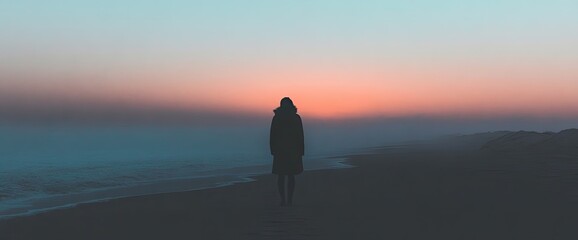 Person at sunset overlooking the coast