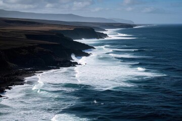 Naklejka premium arafed view of a beach with waves crashing on the shore