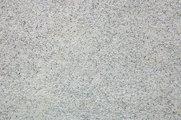 Pebble dash roughcast rendered external house wall background backdrop. External building render style concept.