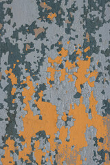 Peeling paint on the wall. Old concrete wall with cracked flaking paint. Weathered rough painted...