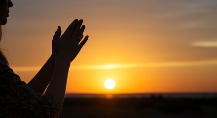 Silhouette of Woman Hands Clapping at Sunset