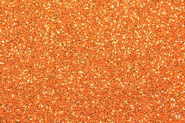 Orange Glitter Texture Christmas Background Sparkling with Festive Warmth and Seasonal Cheer