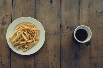 pixel perfect image of flat lay of fast food meal on wood table