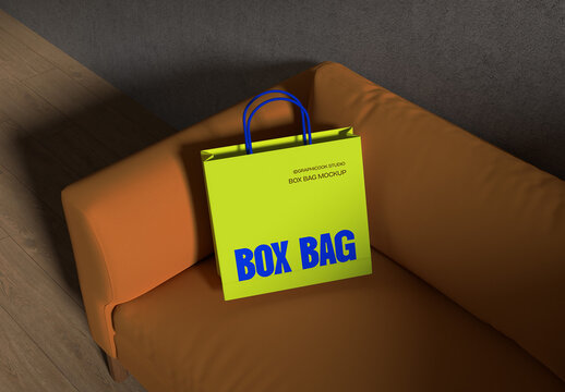 Box Bag on The Sofa Mockup