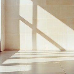 Obraz premium Sunlight streams through window, casting long shadows on light beige tiled wall and floor. Minimalist, bright interior