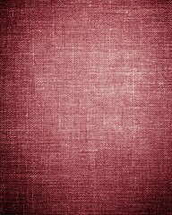 Fototapeta premium Close up of maroon fabric texture background with visible weave in studio shot for design element use