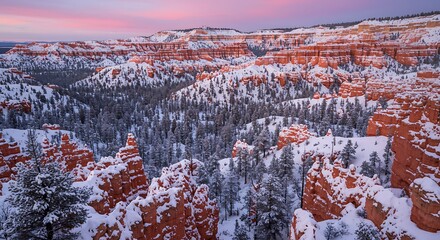 Snow Covered Bryce Canyon at Sunset with Pink Sky in Winter