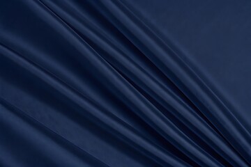 Obraz premium Dark blue silk satin. Soft folds. Fabric. Navy blue luxury background. Space for design.Wavy lines.Banner. Wide.Long. Flat lay, top view table. Beautiful. Elegant. Birthday, Valentine's Day