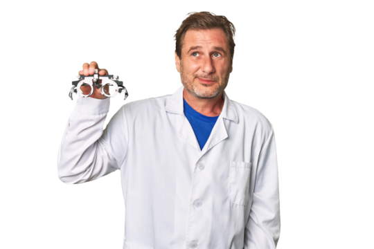 A middle-aged optometrist man dreaming of achieving goals and purposes