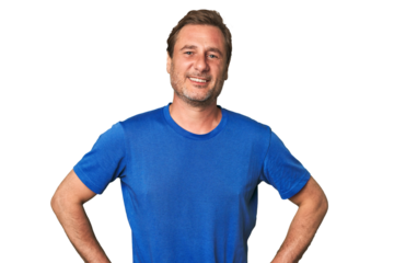 A middle-aged man isolated confident keeping hands on hips.