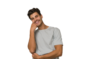 Young handsome caucasian man isolated on white background smiling happy and confident, touching chin with hand.